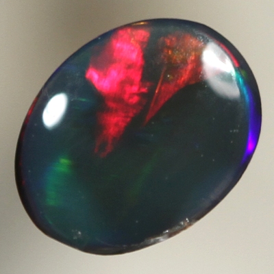 SOLID BLACK OPAL Bright cherry red in a Broad rolling flash